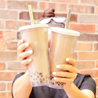 China Custom Reusable Wall Stocked Double 20oz Insulated Boba Milk Tea 12mm Straws Bubble Boba Tea Plastic Tumbler Cups With Lids for sale