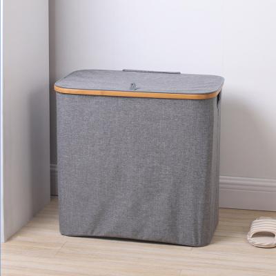 China Modern Pop Woven And Foldable Laundry Hamper Waterproof Bamboo Laundry Hamper With Lid for sale