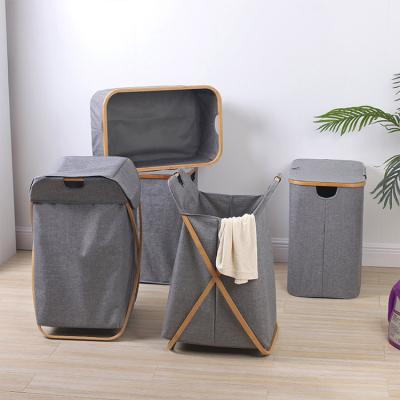 China Modern portable laundry basket made of bamboo and non woven fabric laundry basket with lid and handle for sale