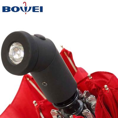 China 2018 Promotional Japanese Automatic Folding Windproof Umbrella 2021 Times Umbrella Torch Flashlight Travel Umbrella With LED Light Handle for sale