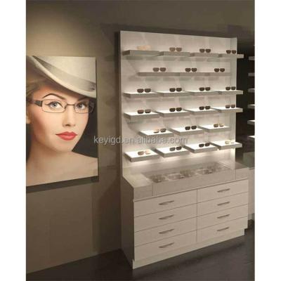 China Supermarket Sunglasses Shop Wooden Wall Mounted Optical Display Light Shelf Furniture Led Display Cabinets With Drawer for sale