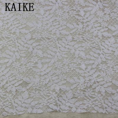 China Elastic Custom Cheap White African Tulle Lace Fabric for sale