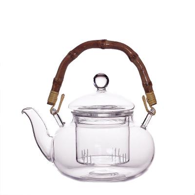 China Viable all-in-one heatproof durable glass teapot with wooden handle high borosilicate glass teapot for sale