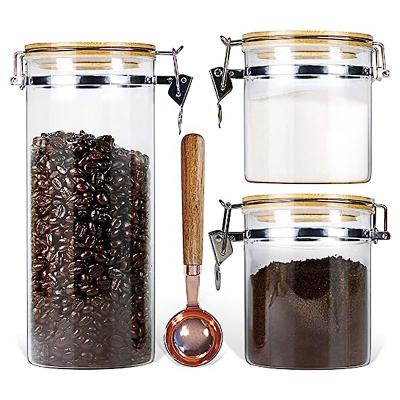 China Viable Wholesale Airtight Bamboo Lids Kitchen Organizers Storage Container High Borosilicate Glass Storage Jar for sale