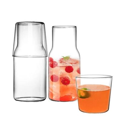 China Newest design 350ml sustainable cup drinkware set of 2 transparent cocktail glasses set with lid borosilicate glass mug for sale