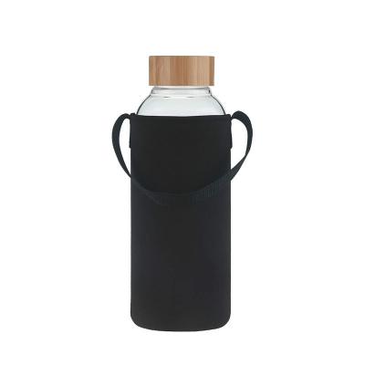 China Borosilicate Glass Silicone Sleeve Bamboo Dishwasher Safe Sustainable Lid 550ml BPA Free Durable Water Bottle for sale