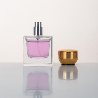 China Custom Square Cube Perfume Bottle Colorful Pink Spray Cosmetic Packaging With Cap Perfume Glass Bottle for sale