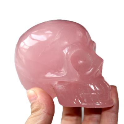 China China Natural Hand Carved Crafts Small Skulls Crystal Skulls Rose Quartz Crystal Skulls for sale