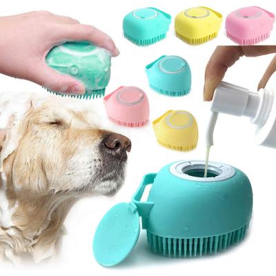 China Pet Stocked Brush Bath Massager Brush Shampoo Dispenser Dog Silicone Shower Grooming Brush Body Scrub For Cat Pets Bathing Products for sale