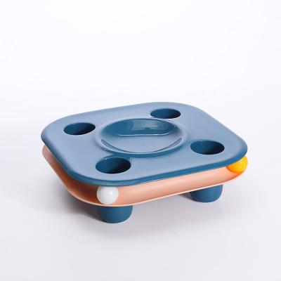 China 2021 Automatic New Multifunctional Cat Food Basin Toy Two In One Pet Eating Basin for sale