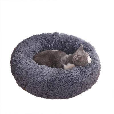 China 2021 New Colorful Travel Faux Fur Pet Bed Fleece Around Calm Soft Plush Nest Warm Donut Cat Dog Pet Bed for sale