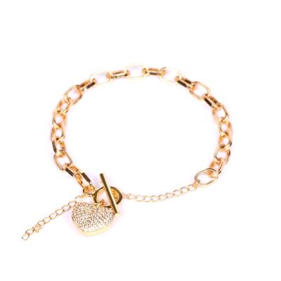 China RFJEWEL Fashion TRENDY Gold Plated Heart Zirconia Bracelet Chain For Women OT Lock Bracelet for sale