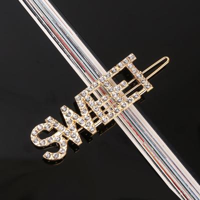 China RFJEWEL 2021 new arrivals women alloy hair alphabet frog clip series KISS letter hair pin with crystals for sale