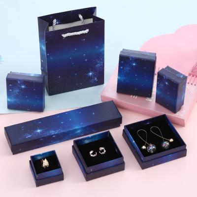 China Luxury Starlight Printing Paper Gift Box RFJEWEL Logo Jewelry Packing Box Ring Earing Specialty Paper Wholesale Custom Necklace for sale