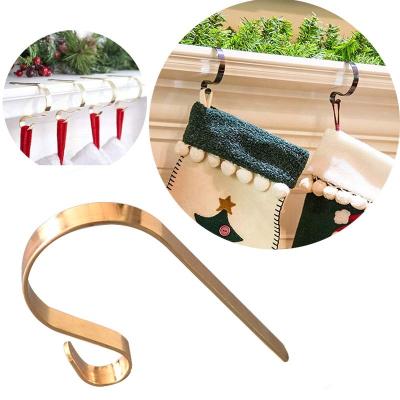 China New Arrivals Wholesale Rose Gold Silver Christmas Fireplace Hanger Hook and Gold Christmas Metal Fireplace Stocking Coat Hanger Hooks for sale