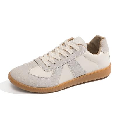 China 2021 fashion trend new all-match white leather shoes flat sports shoes for sale