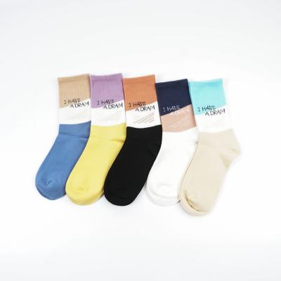 China OEM 2021 breathable combed anti-pilling letter socks autumn/winter cotton news breathable socks for men's colorful socks for sale