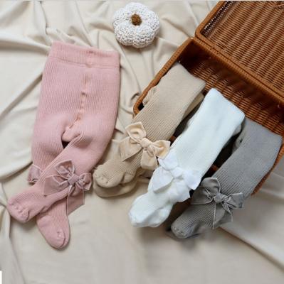 China 2021 New 5 Colors Stock Spanish QUICK DRY Velvet Bow Ribbed Solid Color Combed Thick Cotton Winter Infant Stocking Tights Socks For Baby for sale