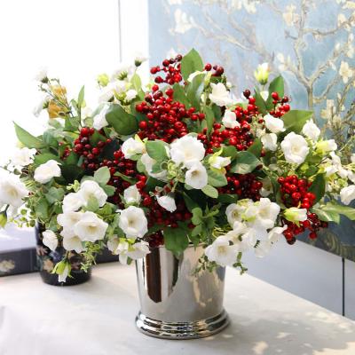 China Hot Selling Eco-friendly Design 7 Heads Group Artificial Flower Arrangements In Table Top Artificial Rose High Quality Home Decoration for sale