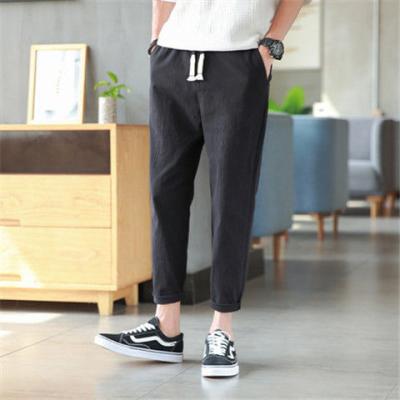 China QUICK DRY men's Korean version of the trend of men's pants pants casual men's trousers summer section cotton wild canvas thin feet for sale