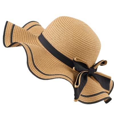 China High Quality Character Design New Women Beach Sun Summer Ladies Vacation Floppy Wide Straw Hat for sale