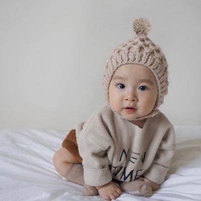 China COMMON Baby Kids Fall Newborn Soft Knitting Cute Earmuffs Pom Pom Beanies Hats Winter Accessories Pattern for sale