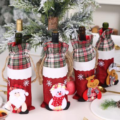 China Exquisite Christmas Party Table Decor Gift Bags Christmas Plaid Champagne Red Wine Bottle Cover With Drawstrings for sale