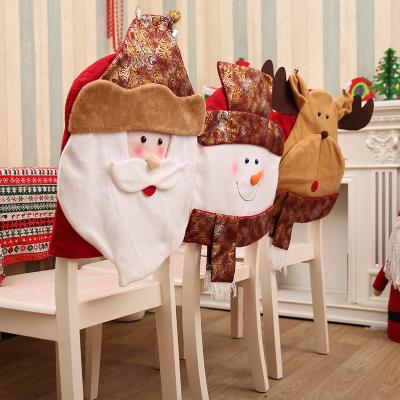 China Soft Touch Christmas Ornament 3D Feeling Santa Claus Chair Cover Hotel Restaurant Christmas Theme Decorations Golden Chairs for sale