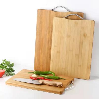 China Customized Viable Multifunctional Chinese Natural Kitchen Household Double Sided Cutting Board Thickened Bamboo Charcoal Cutting Board for sale