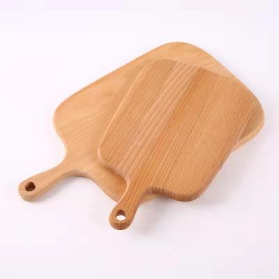 China Sustainable Manufacturer Beech Wood Environmental Household And Commercial Kitchen Utensils Cutting Board With Handle Wood Chopping Board for sale