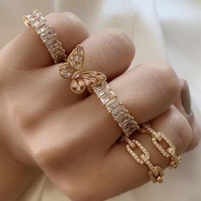 China New CLASSIC Minimalist High End Zirconia Pave Rings Stainless Steel Baguette Rings 18k Gold Plated Bling Crystal Iced Out Ring For Women for sale