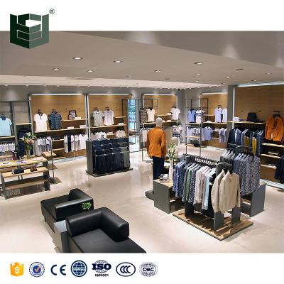 China Wooden Display Products Flsm Customized/OEM/ODM Showroom Fixtures Shelf Props Shop Clothing Racking Display Rack For Men's Store for sale