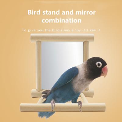 China Stocked Hot Sales Refined Portable Parrot Bird Perch Stand With Mirror Wooden Playground Tripod Perch Gym Pet Toys for sale