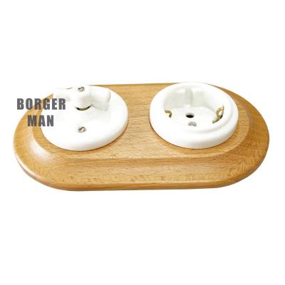 China Safety 2-Gang Retro Recessed Ceramic Lamp Switch Wall Three Way Switch And Socket With Wood Frame for sale