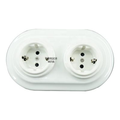 China Safety Schuko Socket With Porcelain Frame For Flush Mount Germany Oulet Wall Socket for sale