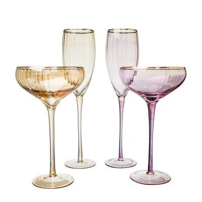 China Stock hot sales pink color with gold rim big ribbed wine glassware champagne flute glass for sale