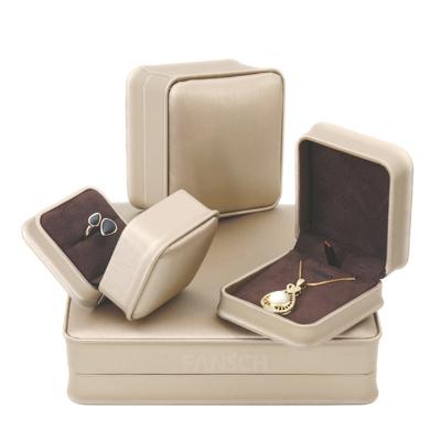 China Supply Beech Gray Lid Boxes Packaging Leather beige Ring Velvet Bracelet Gold Jewelry Box Display Gift Handsome for sale