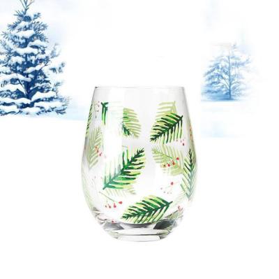 China Viable Handmade Whiskey Juice Glasses Cup Crystal Glass Egg Shape Glass With Christmas Tree Characters And Customized Logo Design for sale