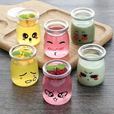 China Wholesale Empty Glass Beverage Factory Price Yogurt Pudding Milk Jar With Plastic Caps for sale