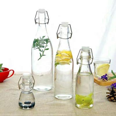 China Wholesale Empty Beverage Factory Price Swing Top Packing Glass Bottles for sale