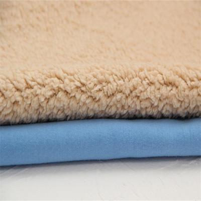 China Stretch high quality single side knitted soft hand feeling bonded 50%polyester 50% cotton sherpa fleece fabric for sale