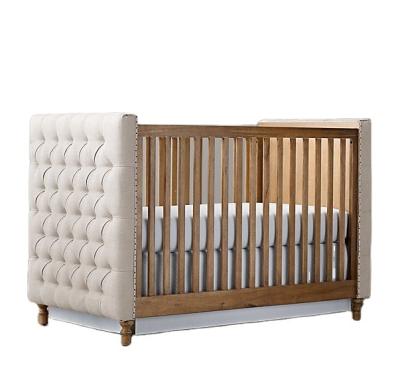 China New Design Modern High Quality Luxury Oak Fabric Baby Crib Baby Crib Solid Wood American Style For Bed Room Hotel Furniture for sale