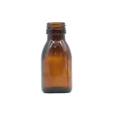 China Custom 60ml Medicine Maple Syrup Glass Amber Round Bottle For Medicine Liquid Syrup for sale