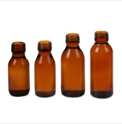 China Medicine Custom 1/2 Oz-32OZ Maple Syrup Amber Round Bottle Glass Bottle For Medicine Liquid Syrup for sale