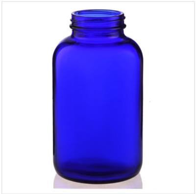 China Custom Pharmaceutical Medicine Tablet Blue Bottle Effervescent Glass Packaging Bottle For Tablet for sale