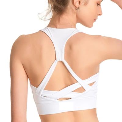 China Breathable Women's Racerback Gym Sports Yoga Tops With Built In Pads for sale