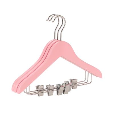 China Scandinavian pink colorful clothes hanger for kids with clips kids coat hanger wholesale space saving wooden hangers for sale