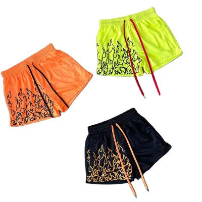 China New Summer QUICK DRY Men Mesh Casual Loose Fitness Mesh Shorts With Drawstring Orange Gym Bodybuilding Shorts Joggers Outside for sale