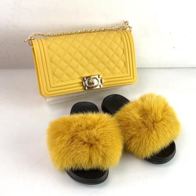 China Fashion Trend Custom 100% Real Fur Slides Sellers Women Freeze Soft Purse Fox Fur Slippers Fox Raccoon Fur Slides With Purse Set for sale