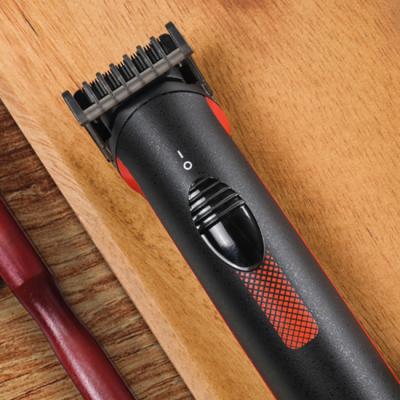 China Unique patented bow knife trims beard and sideburns. Dixix Professional Hair Trimmer DHC8031 Red Professional Electric Hair Trimmer USB Stainless Steel Professional Hair for sale